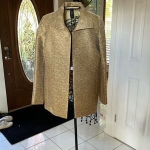 Dressy gold in color. Blazer cold also be worn with jeans.